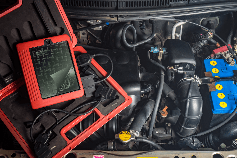 engine diagnostics in arcata, auto repair in Arcata, CA at North Bay Automotive. An image of a vehicle engine bay with a diagnostic scanner, showcasing advanced tools for efficient car repair and troubleshooting.